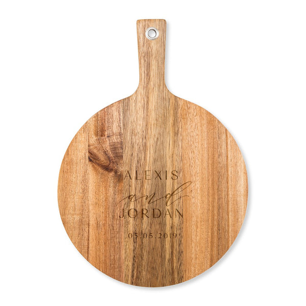 http://ayazay.com/cdn/shop/products/4773-49-1305-106-w_wooden-round-cutting-serving-board-with-handle-modern-couple-etching239552f8992237c954cef1e6b60bed17_grande.jpg?v=1597464932